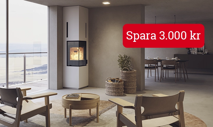 Modern inomhusmiljö med stilren kamin och sittgrupp, samt ett erbjudande om prisreduktion på 3.000 kr.